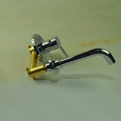 Brass Bathroom Sink Faucet,Silvery Wall Mount Chrome Single Handle Two Holes Bath Taps with Hot and Cold Switch